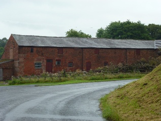 Old farm buildings on the edge of Swettenham. 